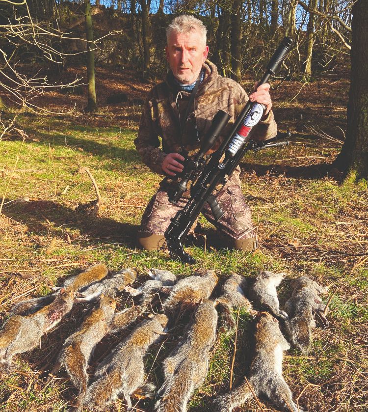 Mick Garvey with several shot grey squirrels