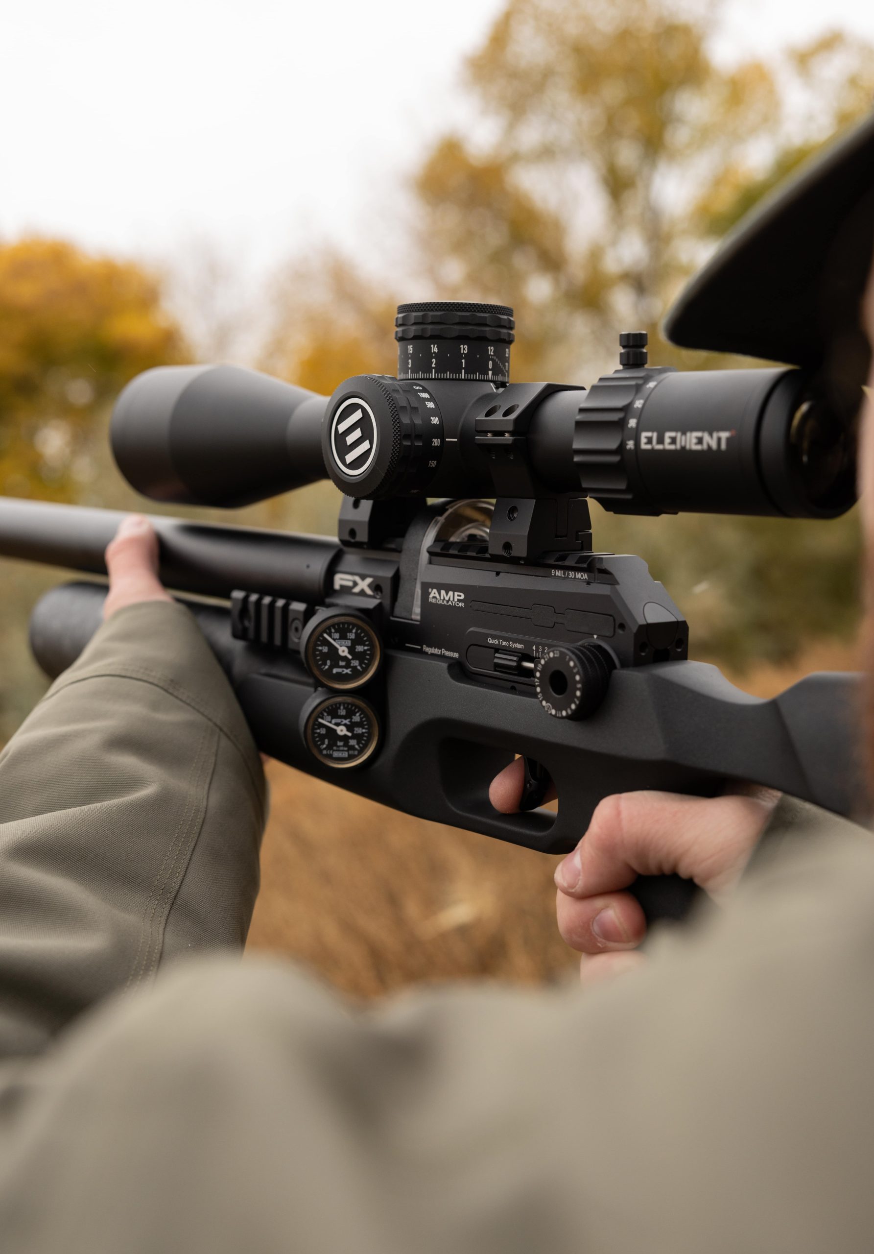 Man holding an air rifle