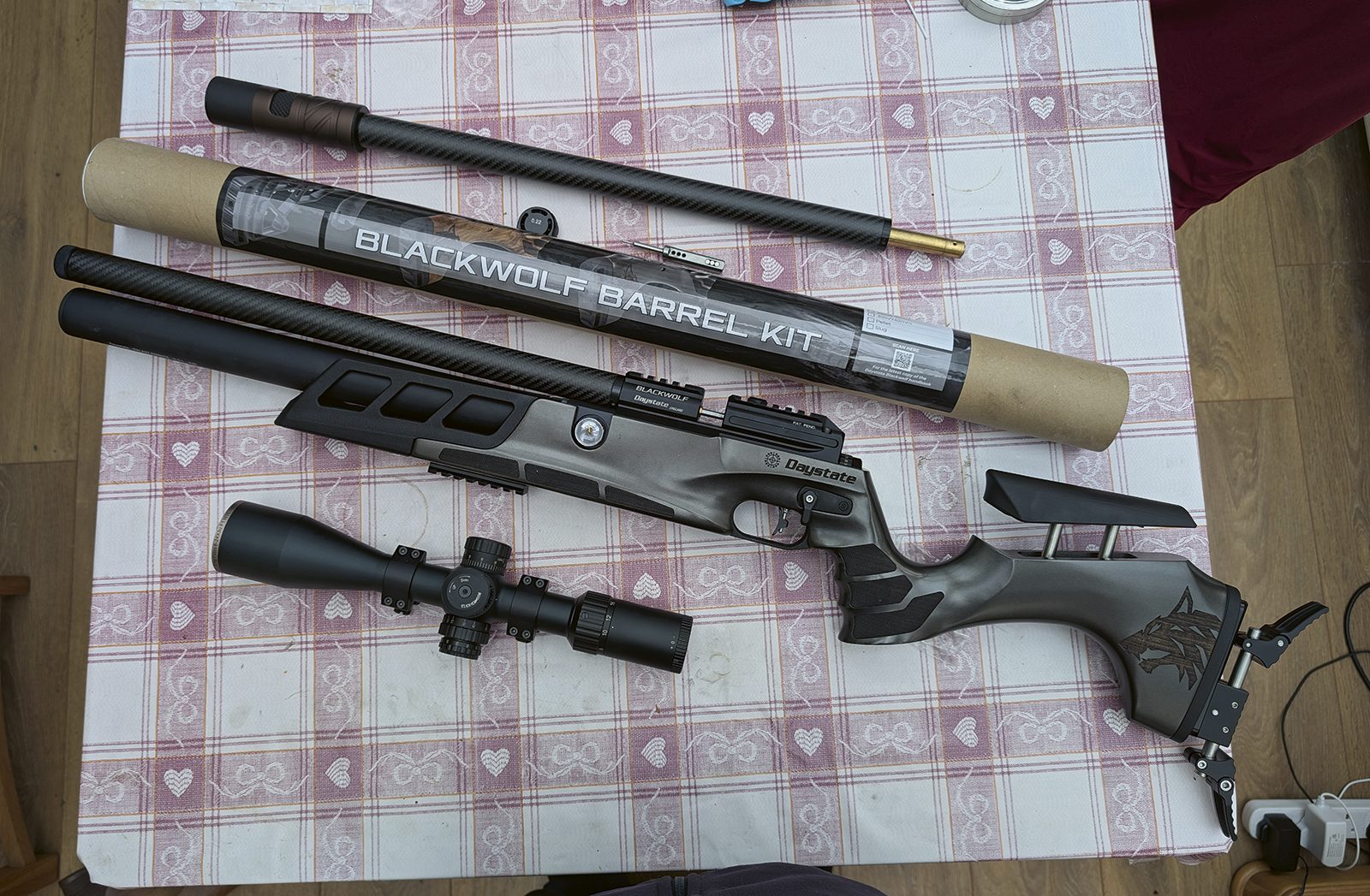 Daystate Blackwolf barrel kit laid out with the rifle, scope and .22 barrel