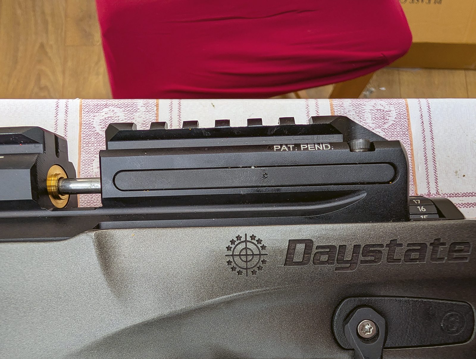 Removing the bolt at the rear of the Daystate Blackwolf rail to free the side plate