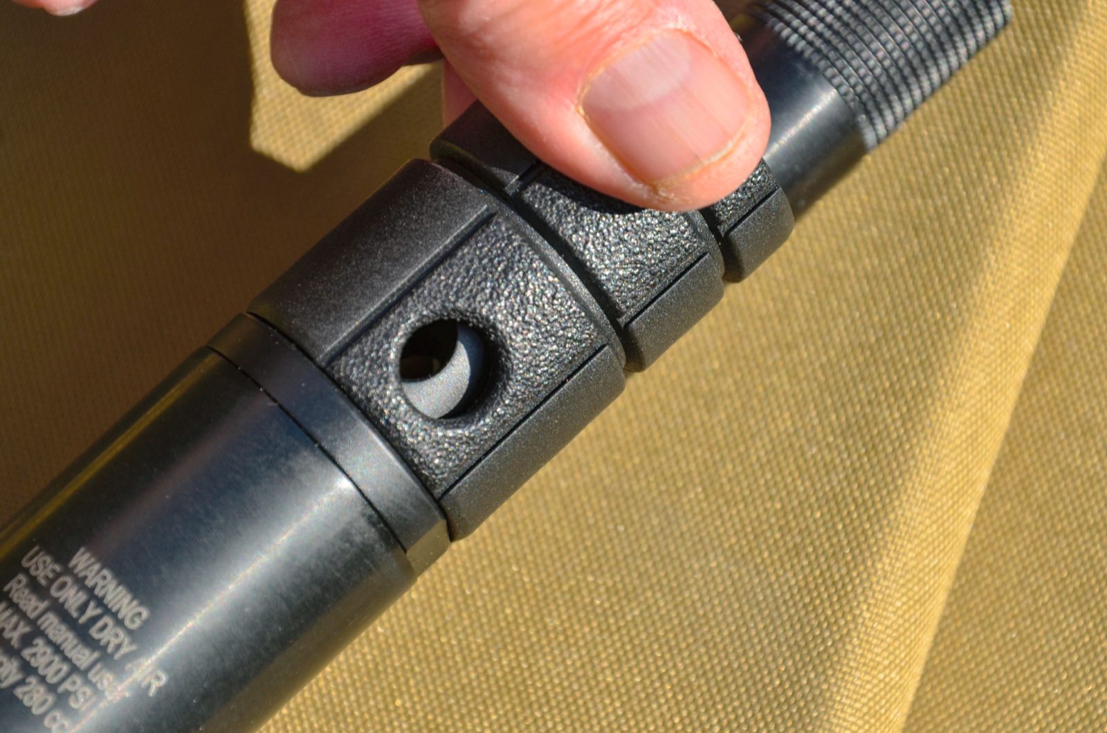 Fill port and dust cover on the EB Arms Agincourt Synthetic air cylinder