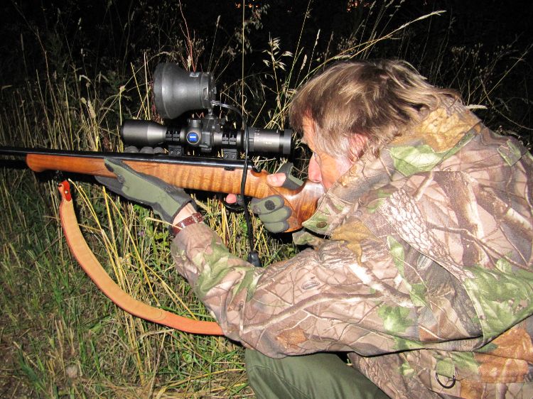 Mike Powell shooting a rifle prone